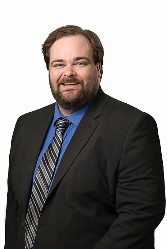 Headshot of J. Collin Spring